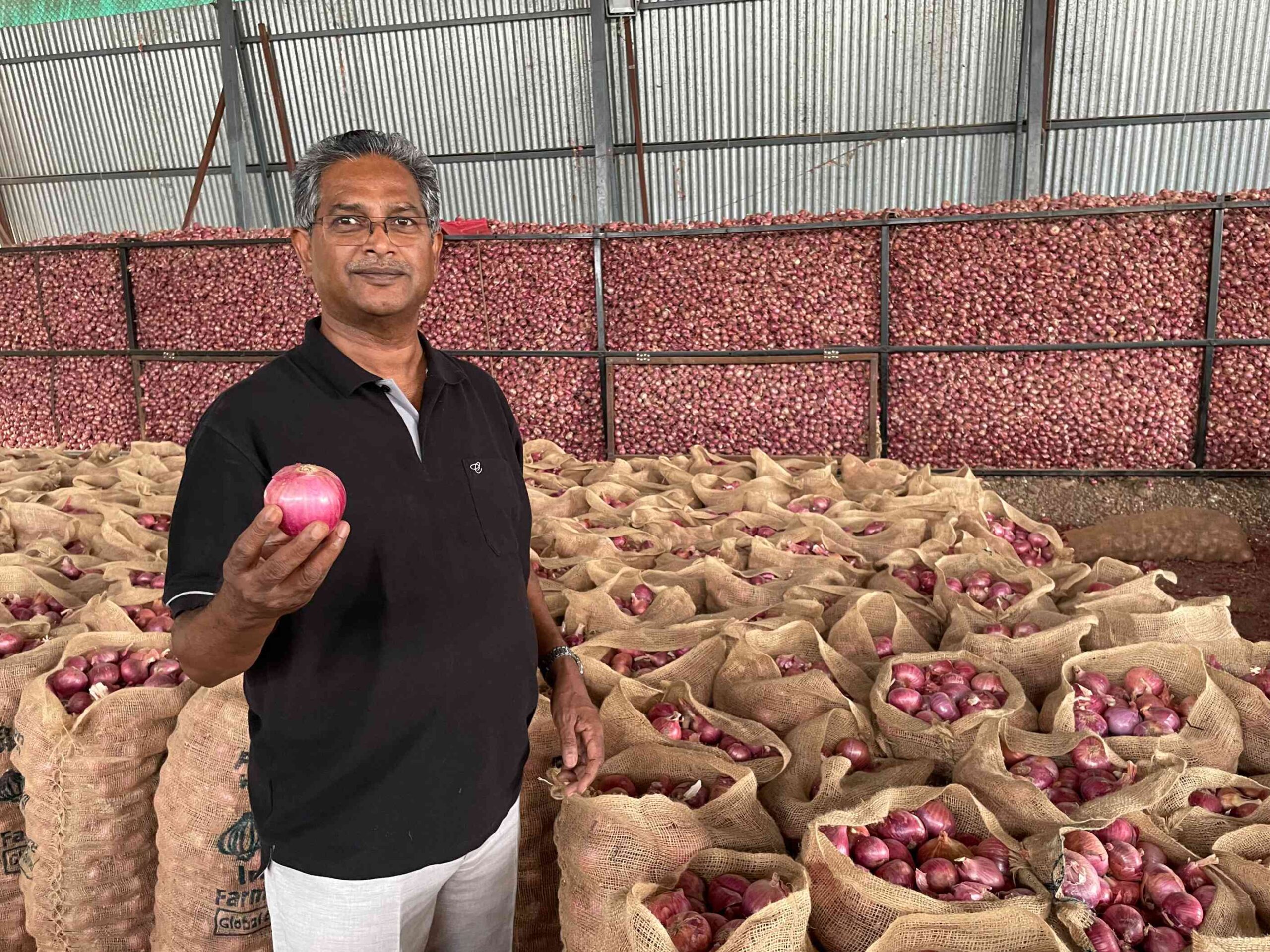 Dr. Koteswara Rao with fresh onions ready for export
